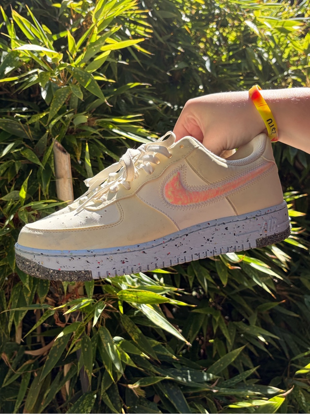 Nike Cream Air Force Sneaker with Orange Swoosh